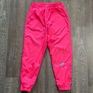 Nike x Atmos NRG Vintage Patchwork Track Pant
Pink/Hyper Jade
